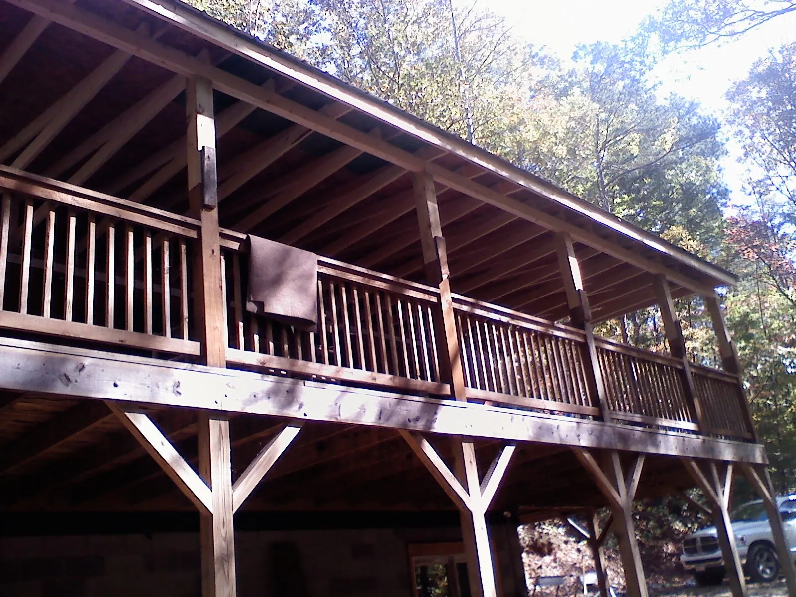 Timber framing under a new elevated porch and deck — Roof Leak Repair in Gold Hill by Roofing Brothers